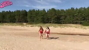 Samantha_lily and Demmy Blaze on the beach