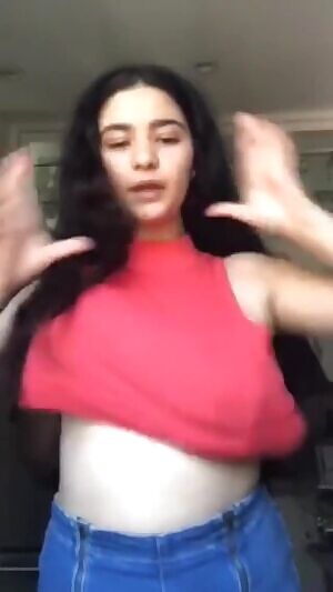 Playing with his girlfriend’s big tits