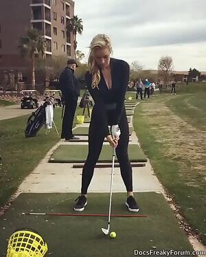 hot golfer chick jiggles and then swings away