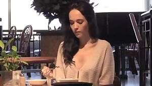 Tit popping out while eating