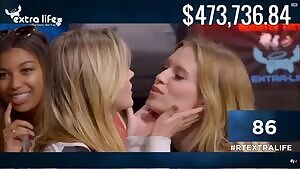 Ashley Jenkins and Barbara Dunkelman kissing for charity