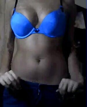 Stripping down to her pink G string