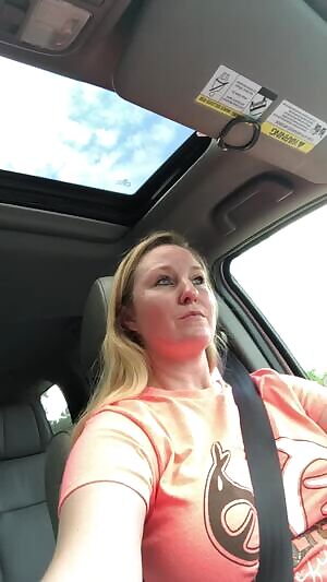Just a mom doing her thing.... showing titties while driving to the car rider line
