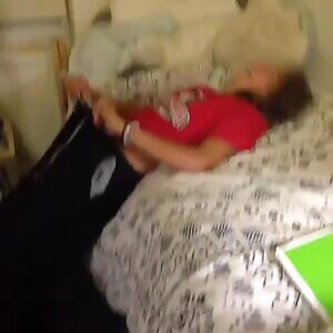 Pulling her pants down