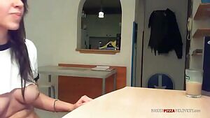 Mostly naked girl sends email while pizza-guy waits