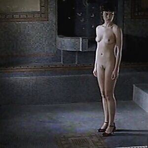 Olga Kurylenko wearing nothing but high heels