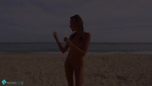 Clover dancing nude in the beach