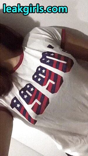 Sexy redhead shows beautiful tits