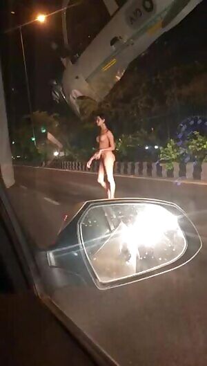 A gaggle of naked broads in the street kicking up dust