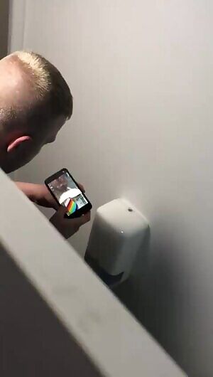 Can anyone find the girl/video the guy is watching?