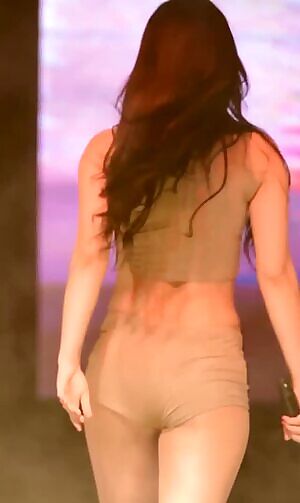 The Tan Tight Shorts Brings out her Ass