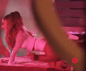 The best part is sadly obstructed, but it's still Ariana Grande in doggystyle position