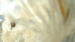 Naked with a face full of cum at the beach