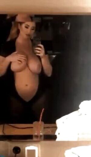 Lucy teasing. If only the zip went a bit further.