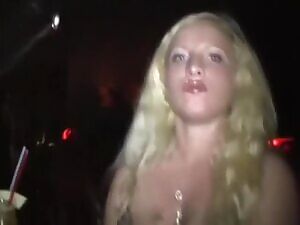 Blonde flirts at the disco bar!