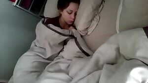 Cumming next to her sleeping sister