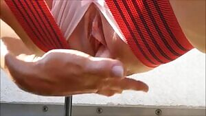 Playing with her pussy and squirting on a swing chair