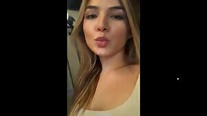 She lifts her dress to show off her simp. I think she wants it kissed.