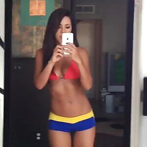 Swaying Her Hips In The Mirror