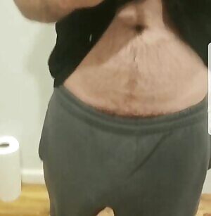 Free-balling in gray sweatpants. I need an eager mouth.