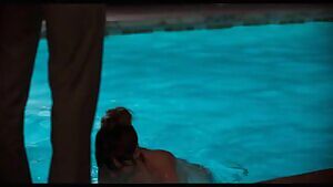 Ana de Armas swimming topless in 