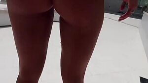 Her mom greasing up her ass in a thong as she flexes her buttcheeks