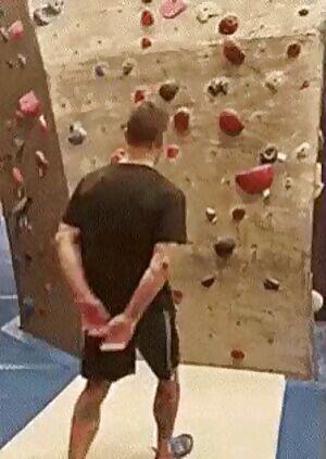 White male climbing corporate ladder during 