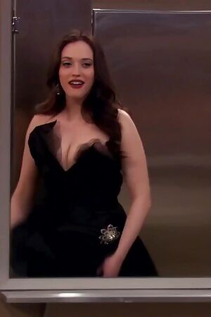 Kat Dennings checking out her huge tits
