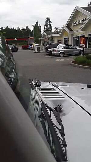 Wetting my jean shorts in a busy parking lot