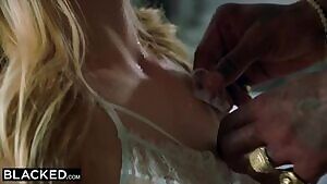 Feeding a blindfolded Ivy Wolfe