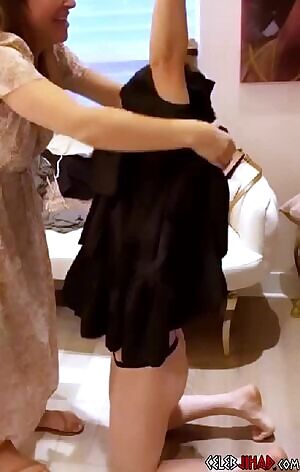 Kaley Cuoco strips to thong