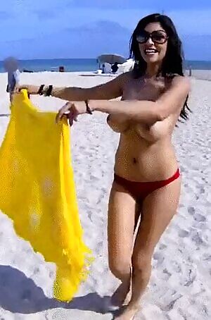 Big Boobs Topless on the Beach