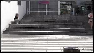 Topless On public stairs