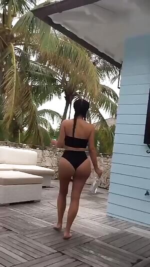 Anyone got more of Kim walking with her ass out..