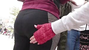 Sam and Ashley goofing off with each other's butts