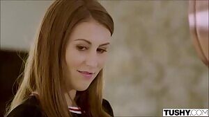 On her knees and under his desk