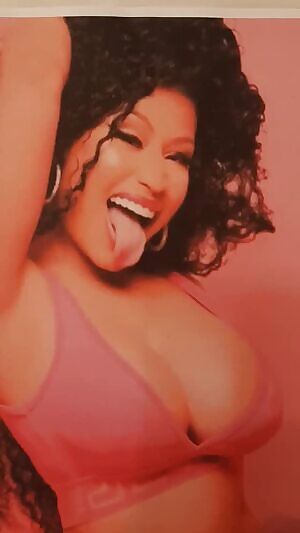 Queen Nicki sticking her tongue out for a load