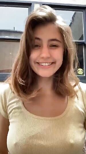 Lia Marie Johnson showing her tattoo... and her hard nipples