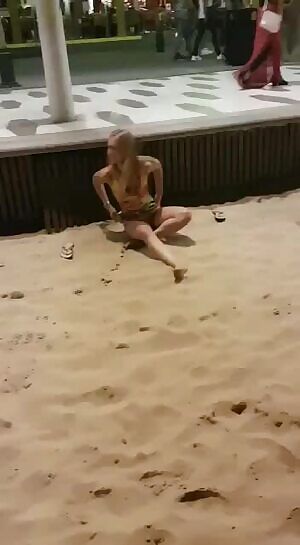 Girl rubs one out on the promenade
