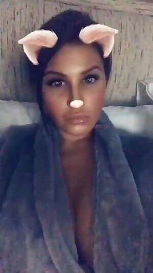 LP showing new nose and braless cleavage