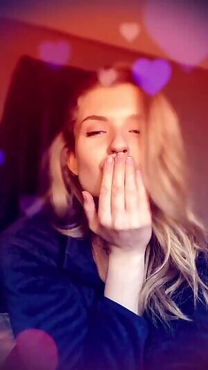 Blowing a quick kiss