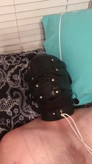 What you don’t see is the 4” dildo in his mouth