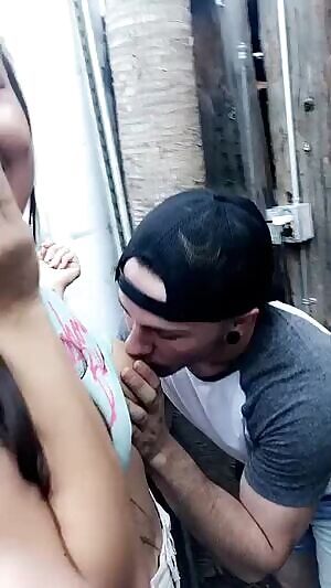 Getting her tit sucked at a party