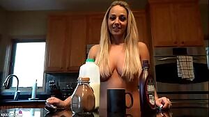 Next Door Nikki pouring chocolate syrup on her tits