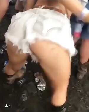 White girl trying to impress football team with her twerking at a party