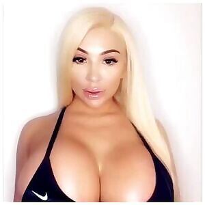 Blonde bimbo with huge tits