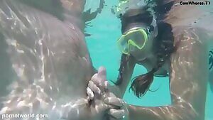 Handjob and blowjob under water