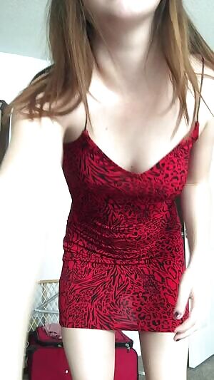 She's got the red dress on!