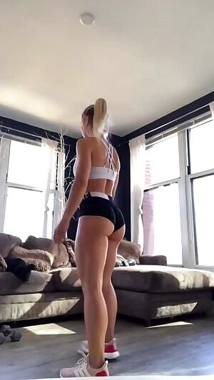 Fitness model Sarah Houchens does jump squats and side lunges