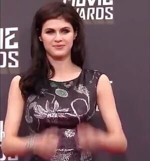 Alexandra raises her arms